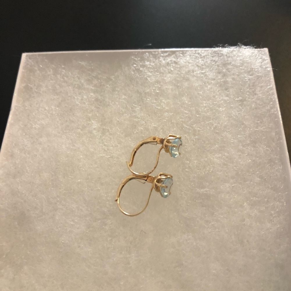 Heart shaped light blue stone leverback earrings